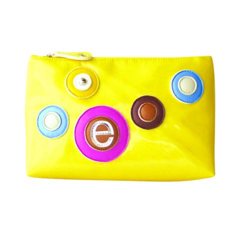 Yellow cosmetic bag with patches on front side