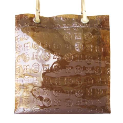 PVC tote bag with repeating logos all around the bag 